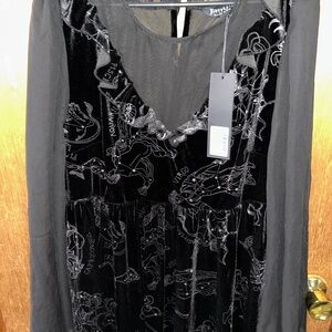 Woman’s velvet dress